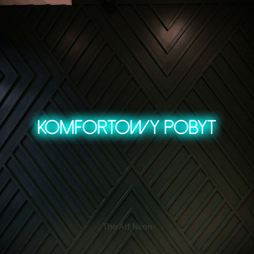 LED neon sign reading “Komfortowy Pobyt”, arranged in a single line.