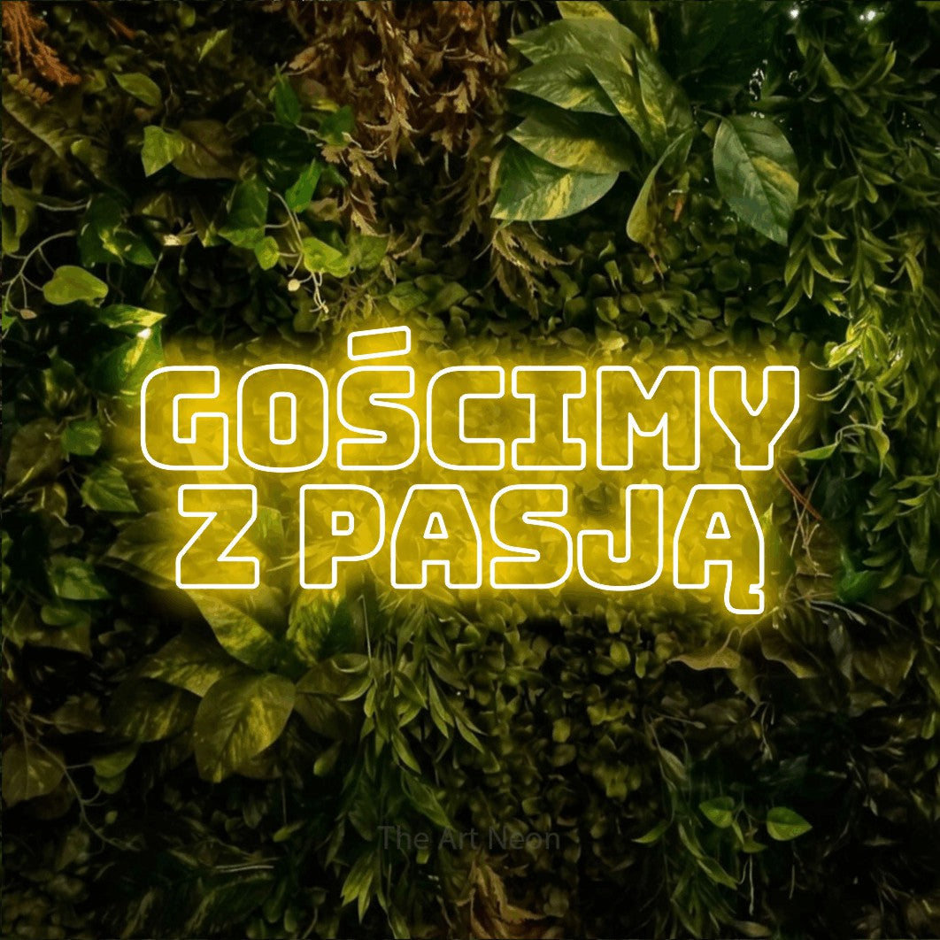 LED neon sign reading “Gościmy z pasją”, arranged in two lines.