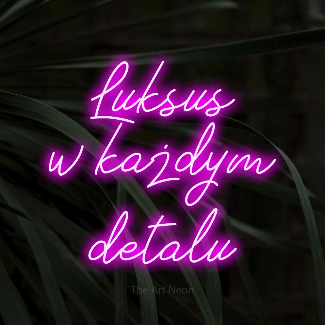 LED neon sign reading “Luksus w każdym detalu”, arranged in three lines.