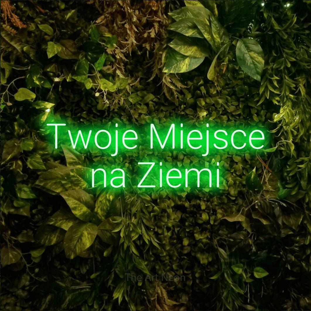 LED neon sign reading “Twoje Miejsce na Ziemi”, arranged in two lines.
