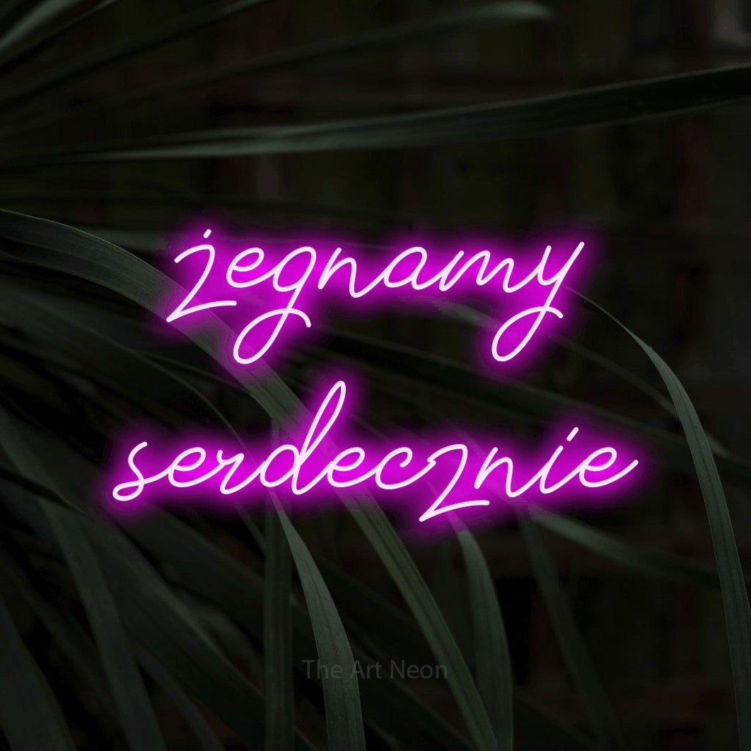 LED neon sign reading “żegnamy serdecznie”, arranged in two lines.