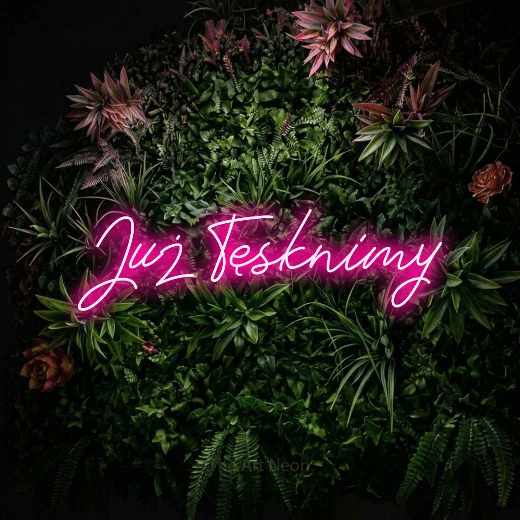 LED neon sign reading “Już Tęsknimy”, arranged in a single line.