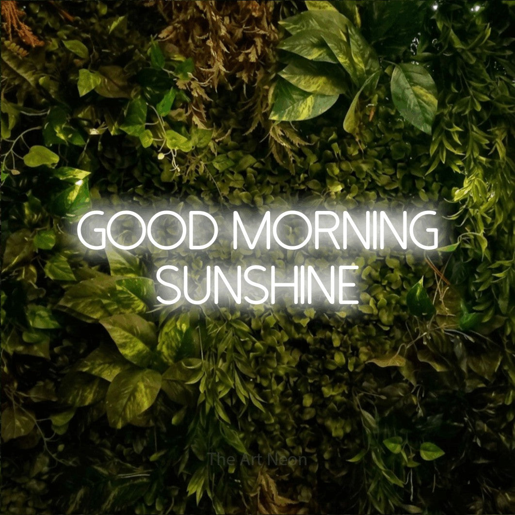 LED neon sign reading “good morning SUNSHINE”, arranged in two lines.
