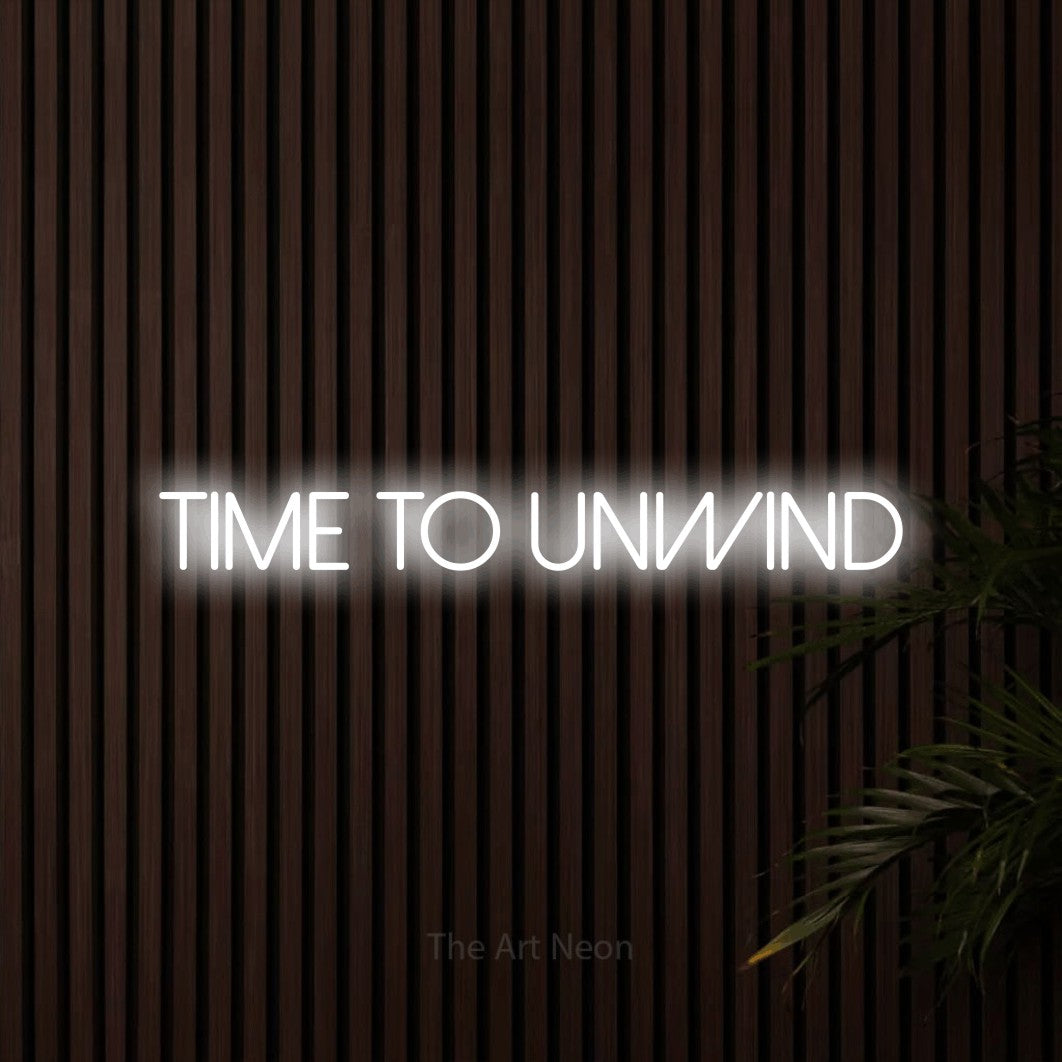 LED neon sign reading “Time to Unwind”, arranged in a single line.