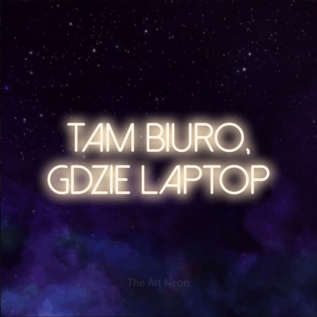 LED neon sign reading “tam biuro, gdzie laptop”, arranged in two lines.