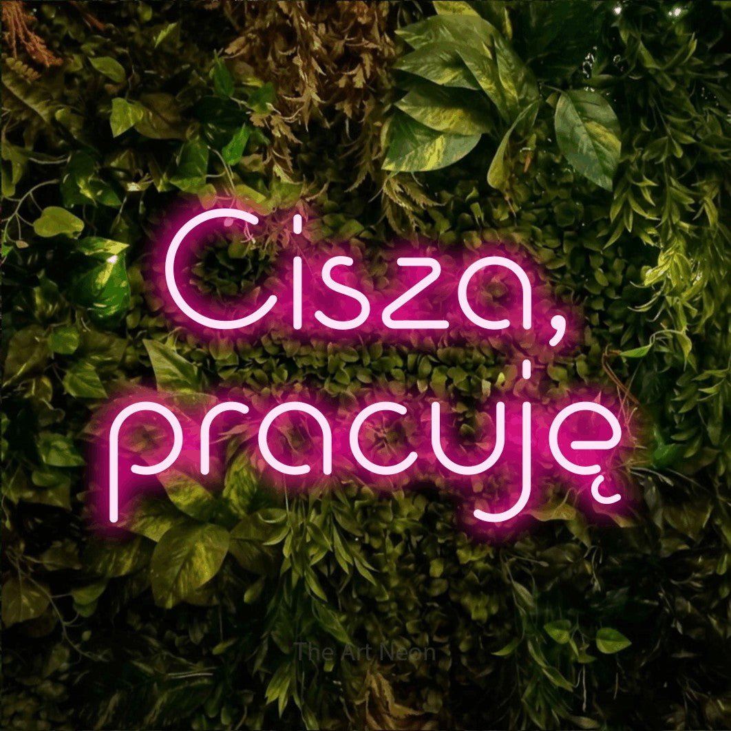 LED neon sign reading “Cisza, pracuję”, arranged in two lines.
