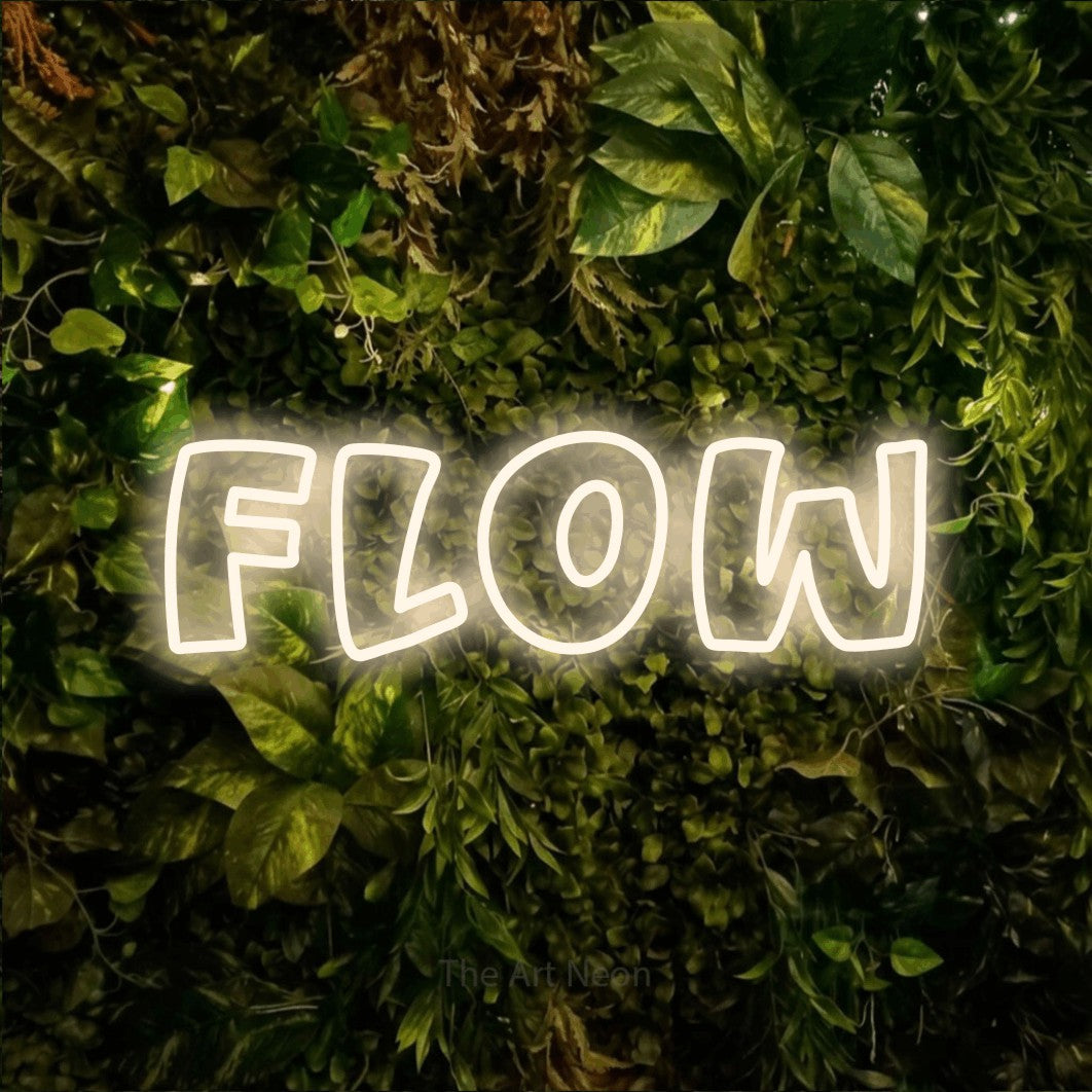 LED neon sign reading “FLOW”, arranged in a single line.