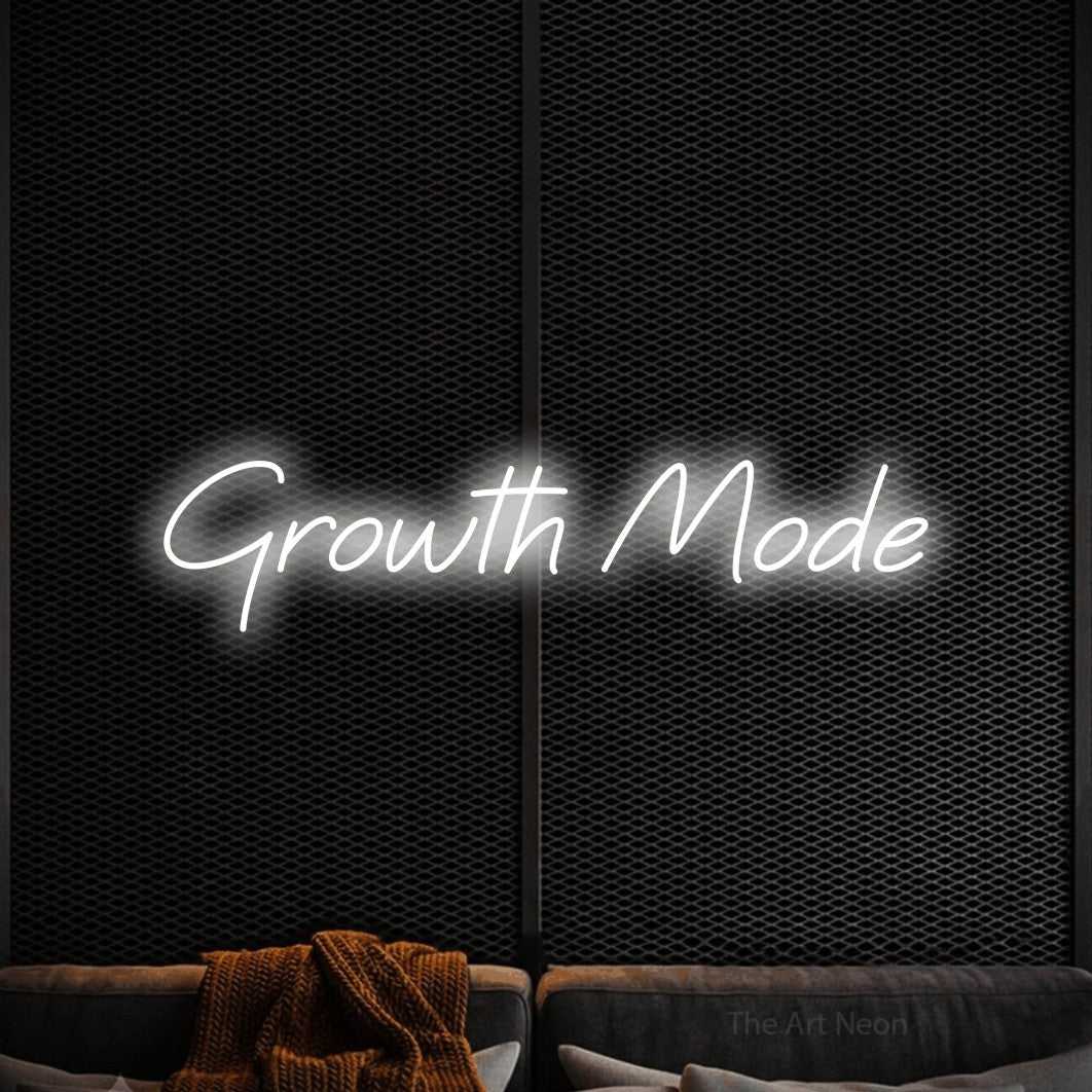 LED neon sign reading “Growth Mode”, arranged in a single line.