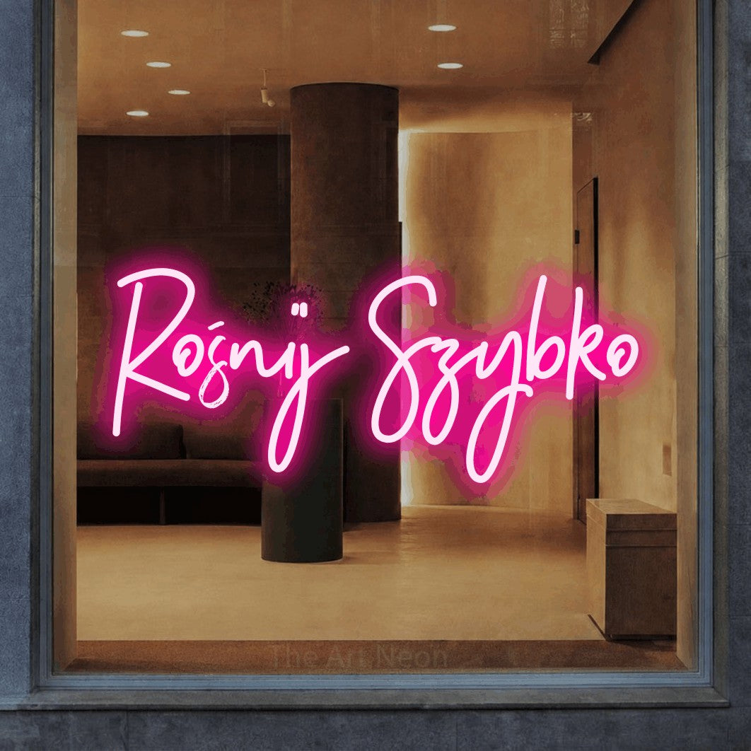 LED neon sign reading “Rośnij Szybko”, arranged in a single line.