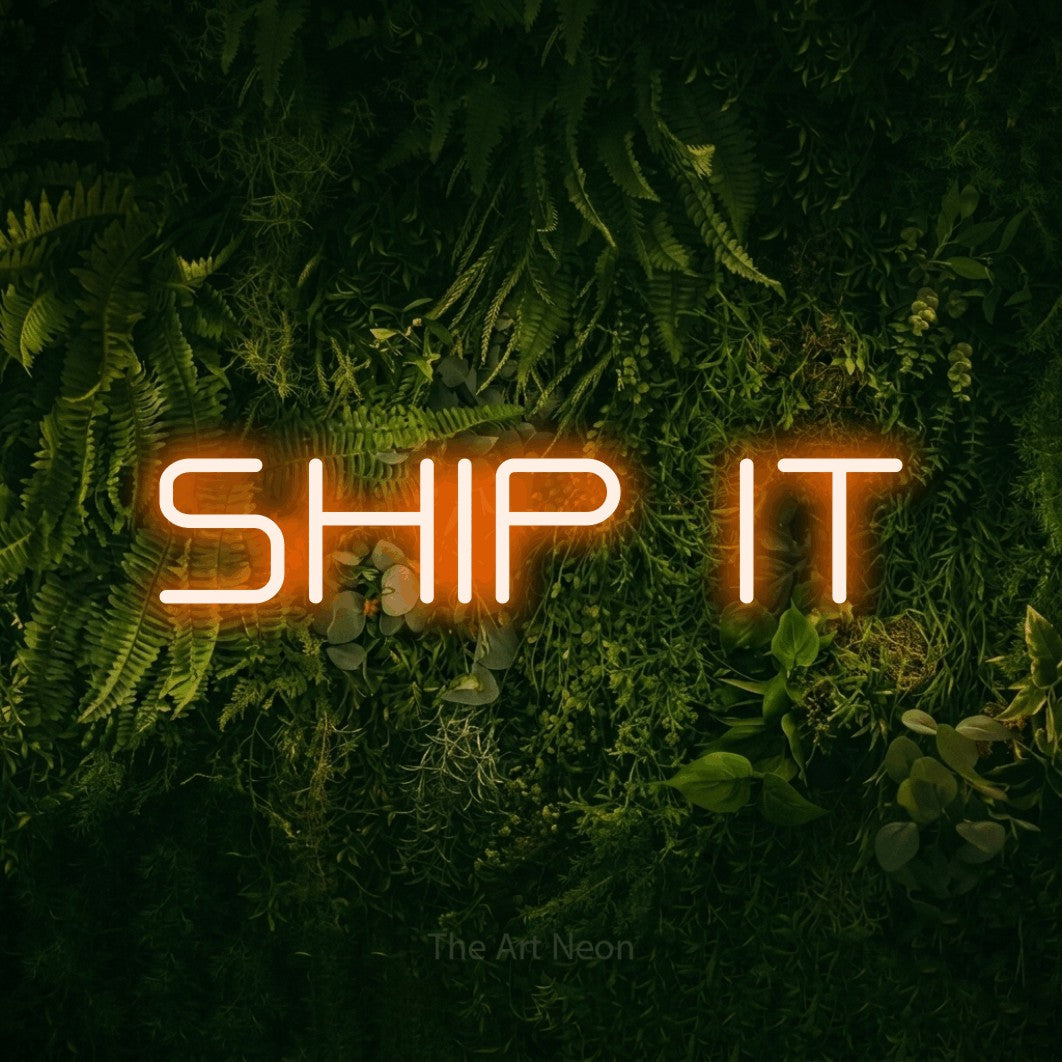 LED neon sign reading “SHIP IT”, arranged in a single line.