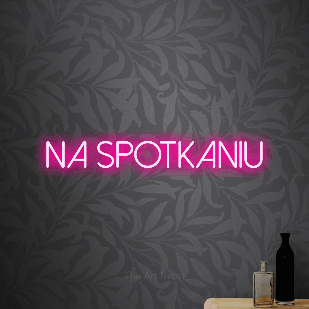 LED neon sign reading “NA SPOTKANIU”, arranged in a single line.