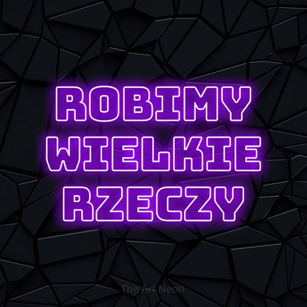 LED neon sign reading “Robimy wielkie rzeczy”, arranged in three lines.