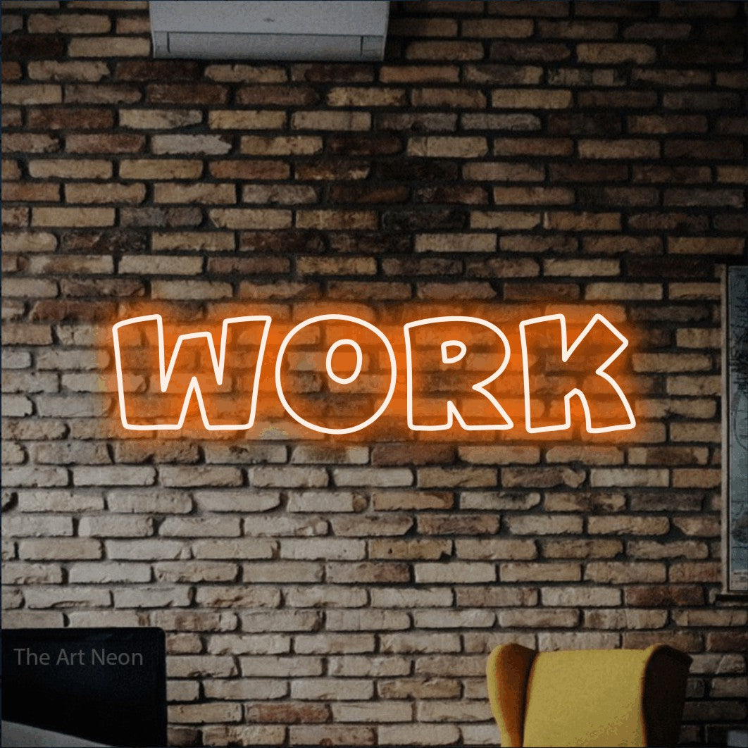 LED neon sign reading “Work”, arranged in a single line.