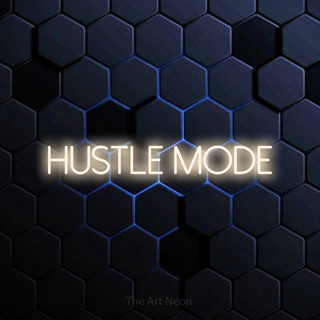 LED neon sign reading “HUSTLE MODE”, arranged in a single line.