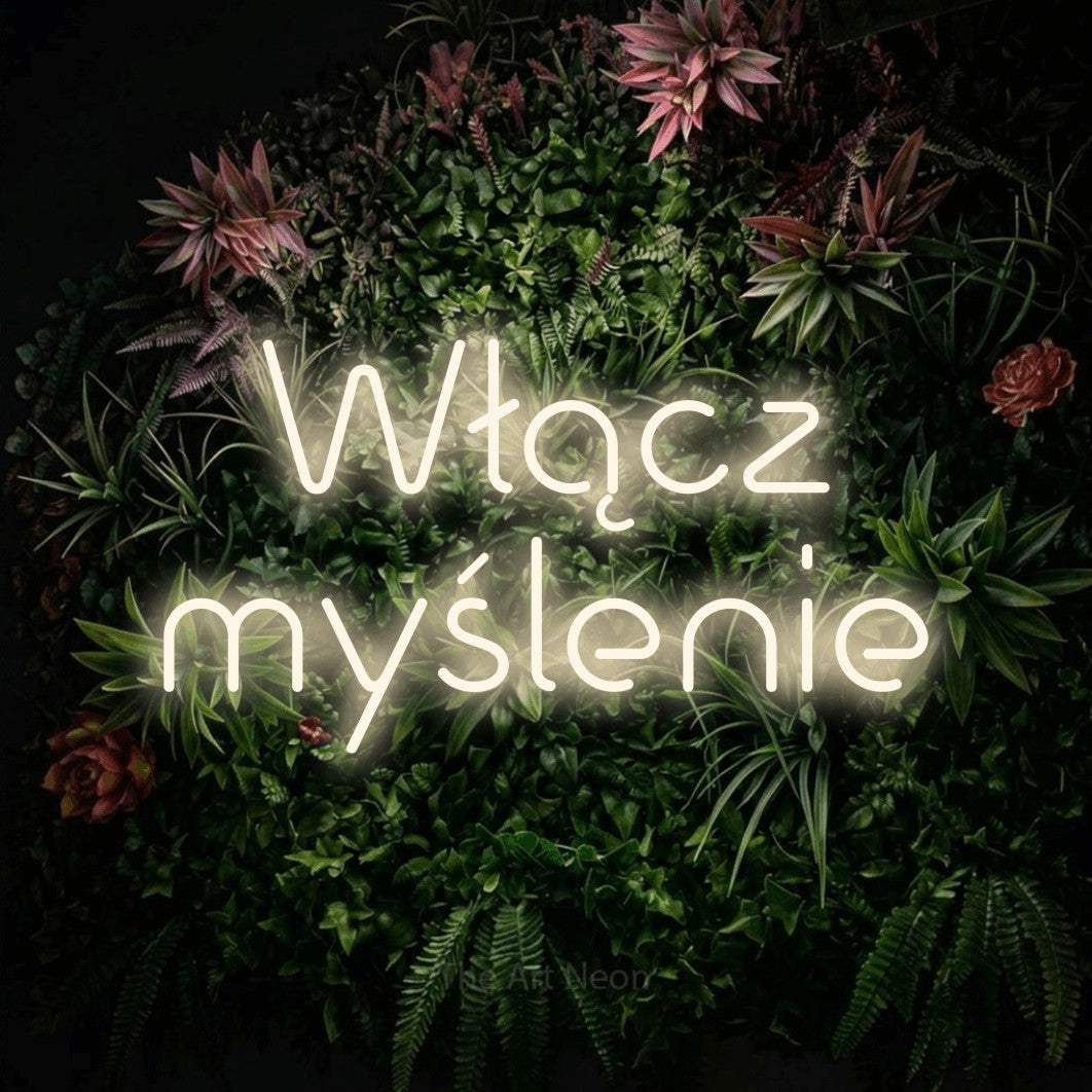 LED neon sign reading “Włącz myślenie”, arranged in two lines.