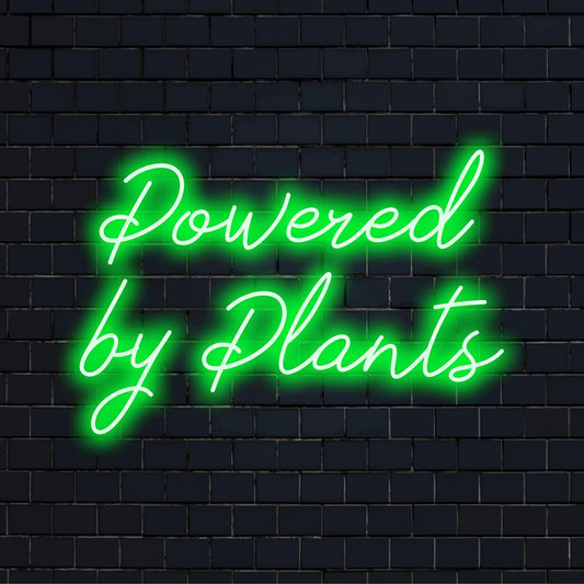 Custom made LED neon sign that reads Powered By Plants, perfect for plant lovers and eco-friendly neon decor.