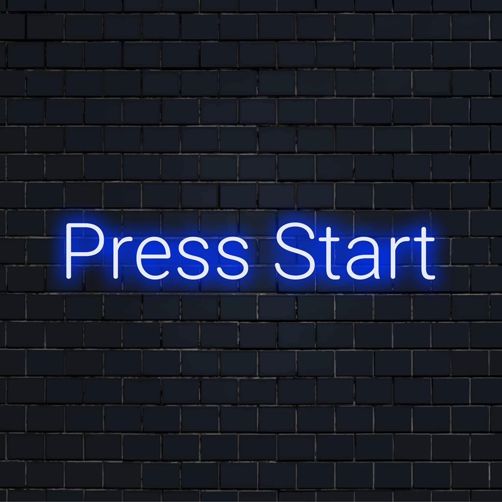 Ζωντανή προσαρμοσμένη επιγραφή LED νέον με τη φράση Press Start. ιδανικό για να προσθέσετε μια ρετρό ατμόσφαιρα παιχνιδιού σε οποιονδήποτε χώρο.