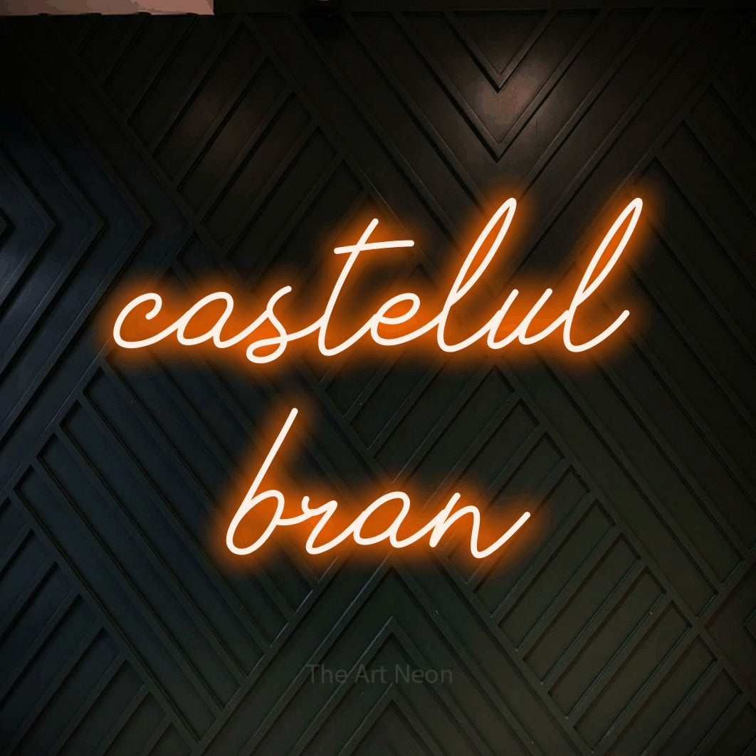 LED neon sign reading “castelul bran”, arranged in two lines.