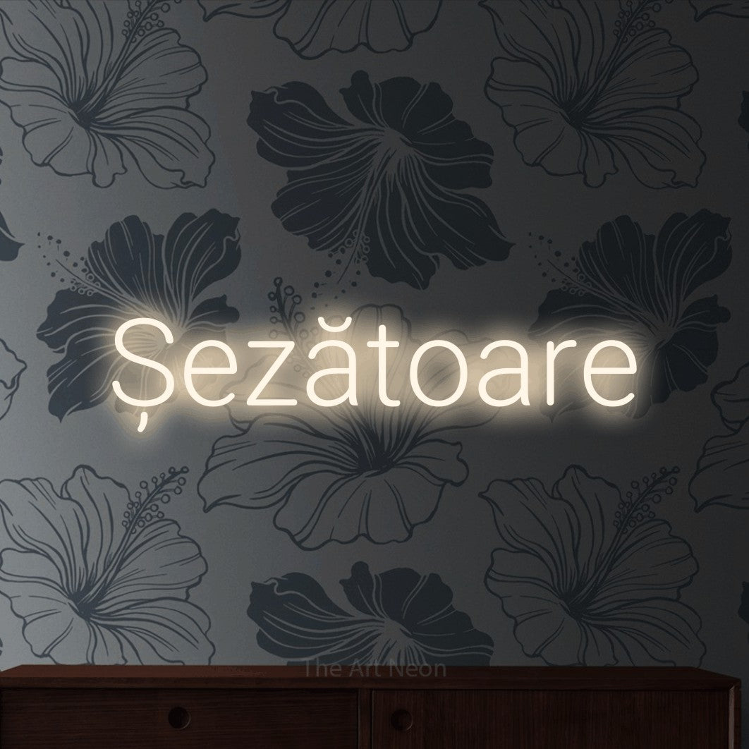 LED neon sign reading “Șezătoare”, arranged in a single line.