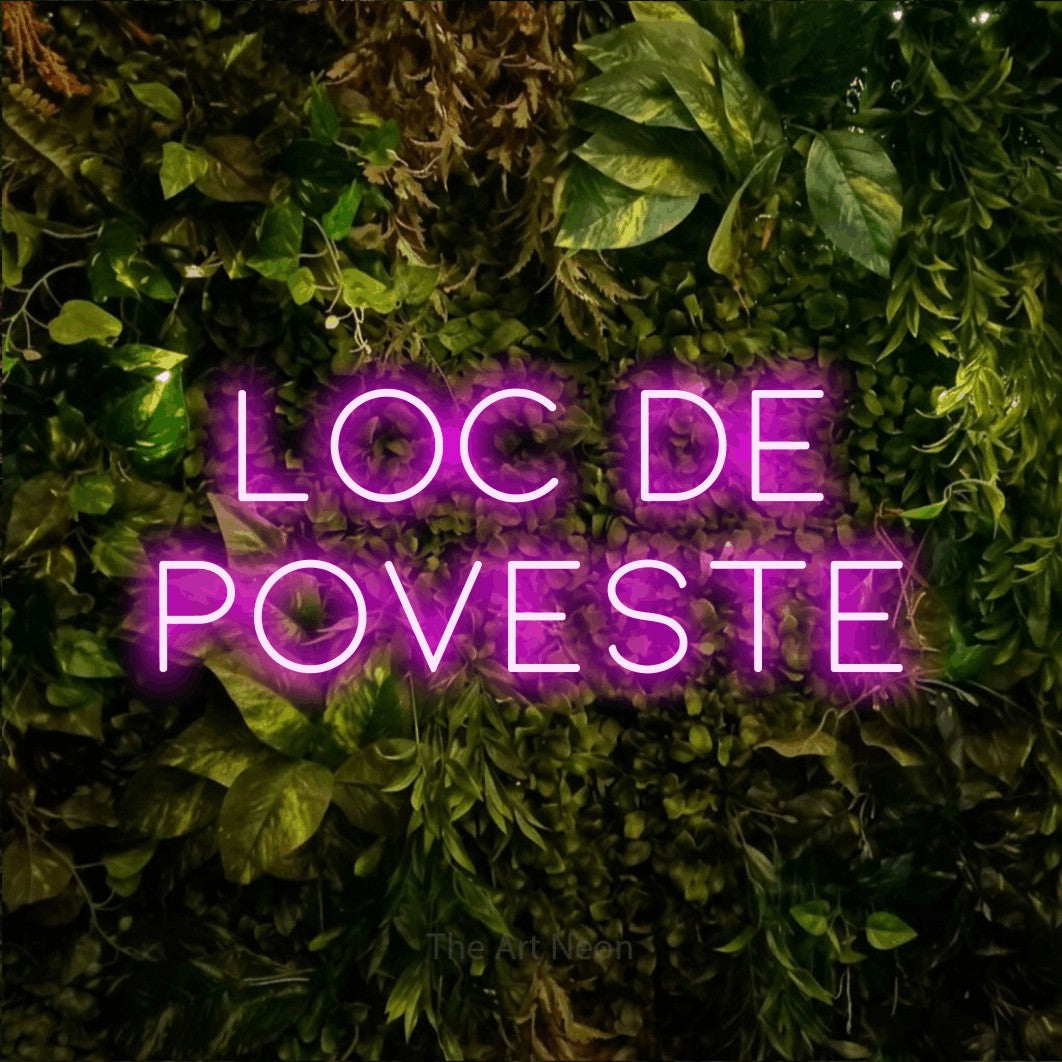 LED neon sign reading “loc de poveste”, arranged in two lines.