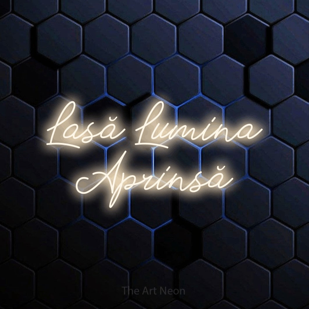 LED neon sign reading “Lasă Lumina Aprinsă”, arranged in two lines.