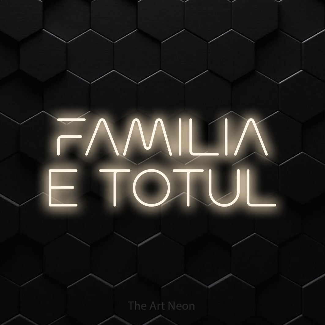 LED neon sign reading “FAMILIA E TOTUL”, arranged in two lines.