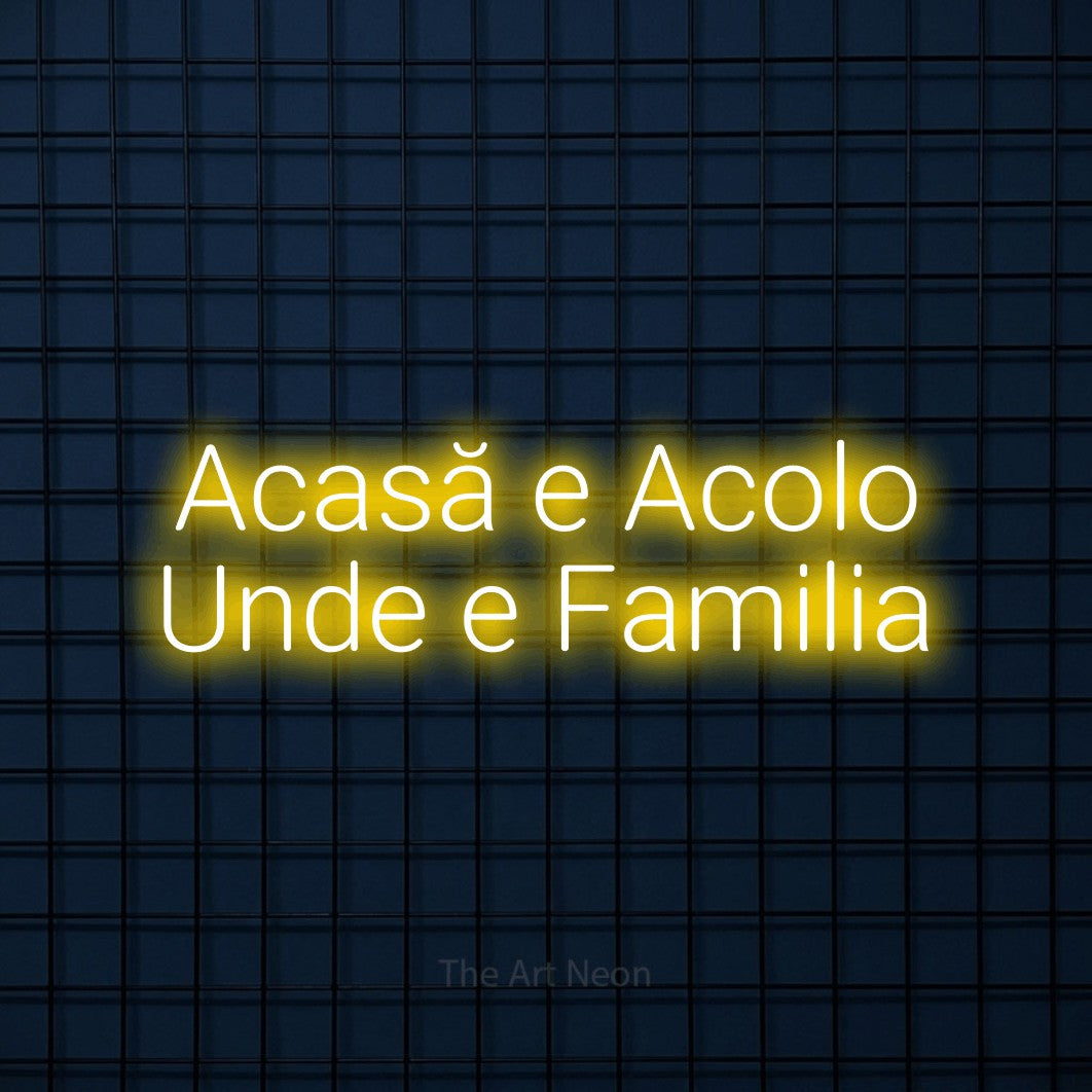 LED neon sign reading “Acasă e Acolo Unde e Familia”, arranged in two lines.
