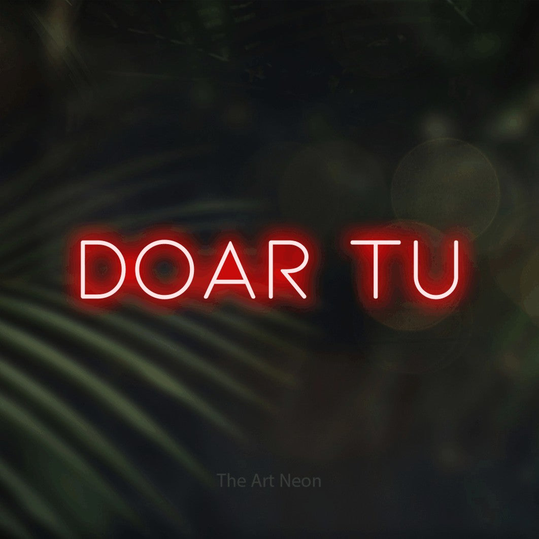 LED neon sign reading “Doar tu”, arranged in a single line.