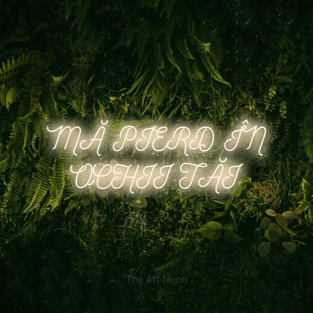 LED neon sign reading “MĂ PIERD ÎN OCHII TĂI”, arranged in two lines.