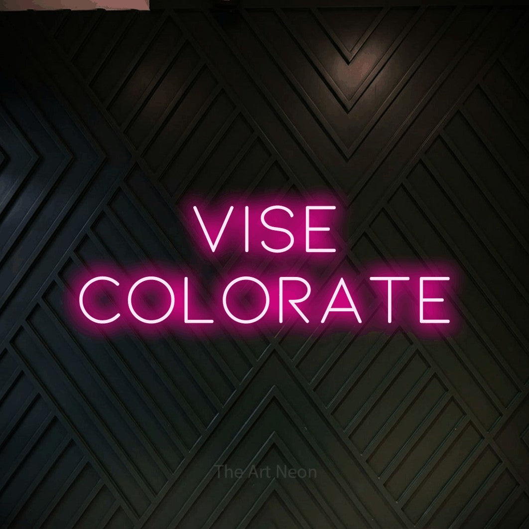 LED neon sign reading “Vise COLORATE”, arranged in two lines.