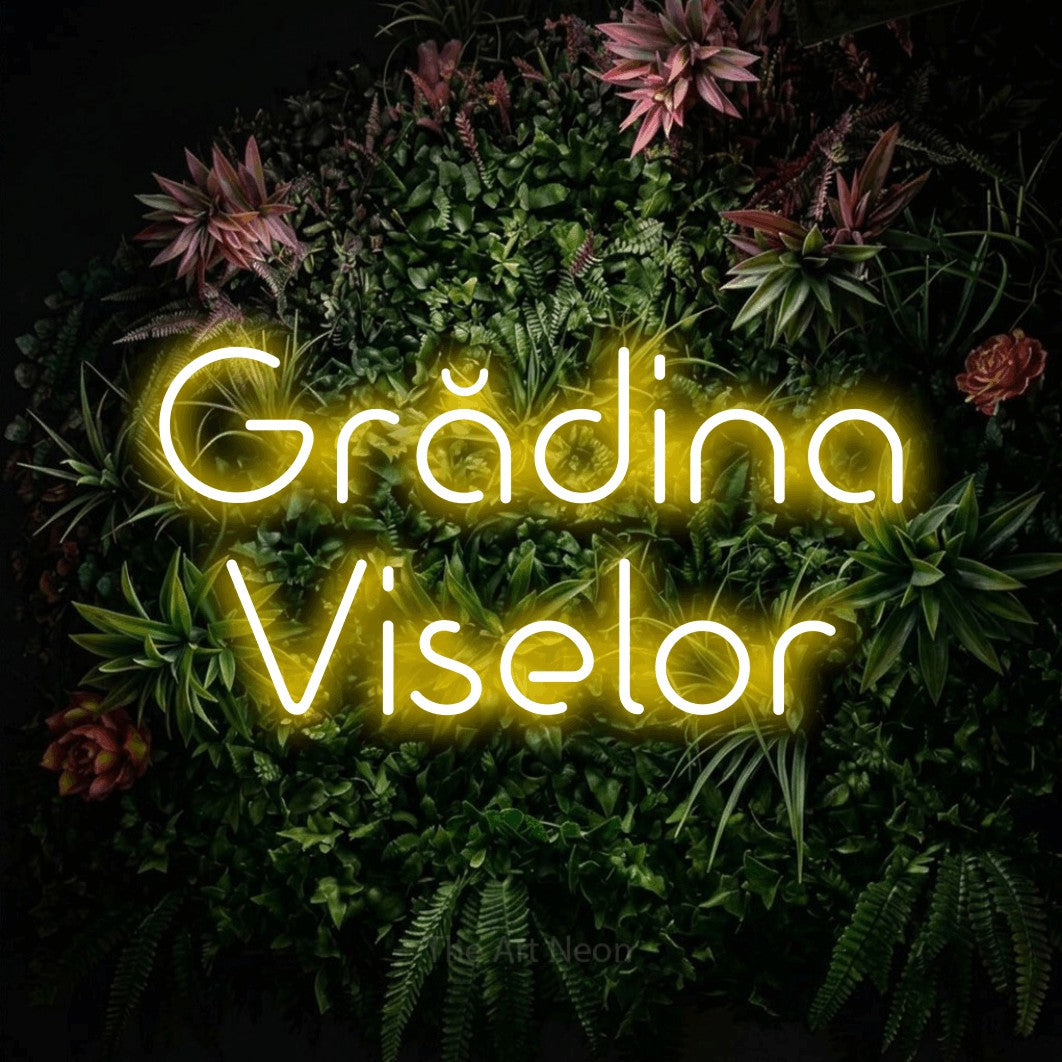 LED neon sign reading “Grădina Viselor”, arranged in two lines.