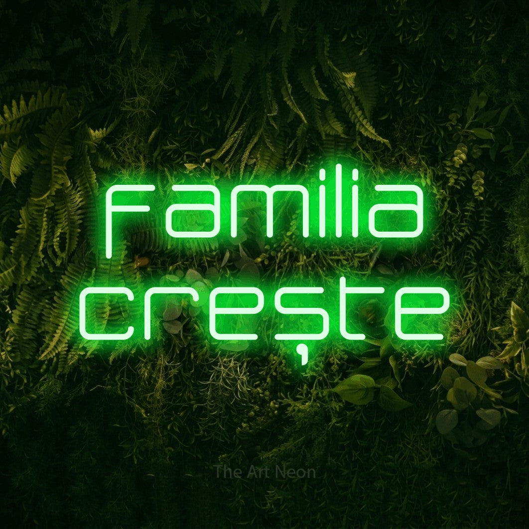 LED neon sign reading “familia crește”, arranged in two lines.