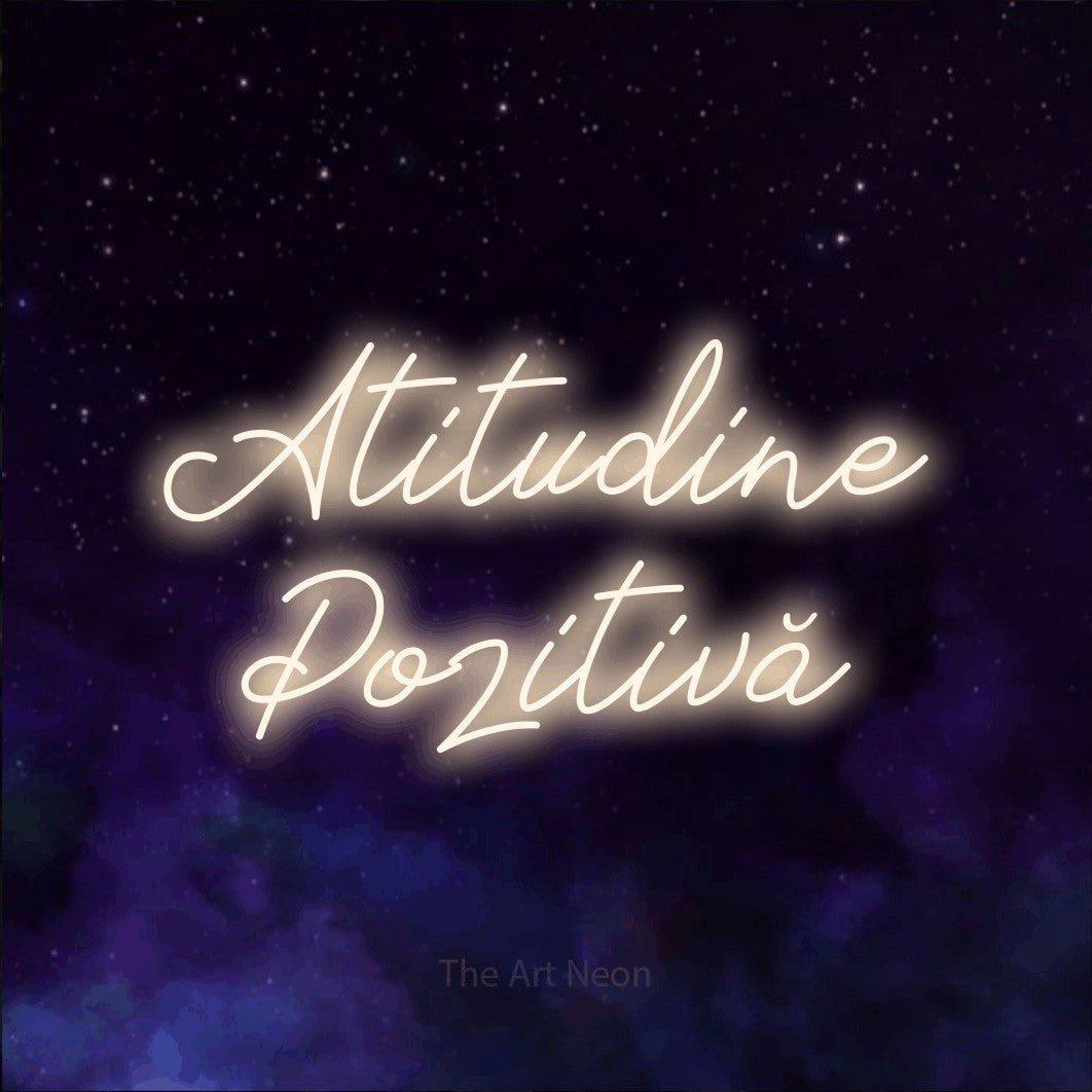 LED neon sign reading “Atitudine Pozitivă”, arranged in two lines.