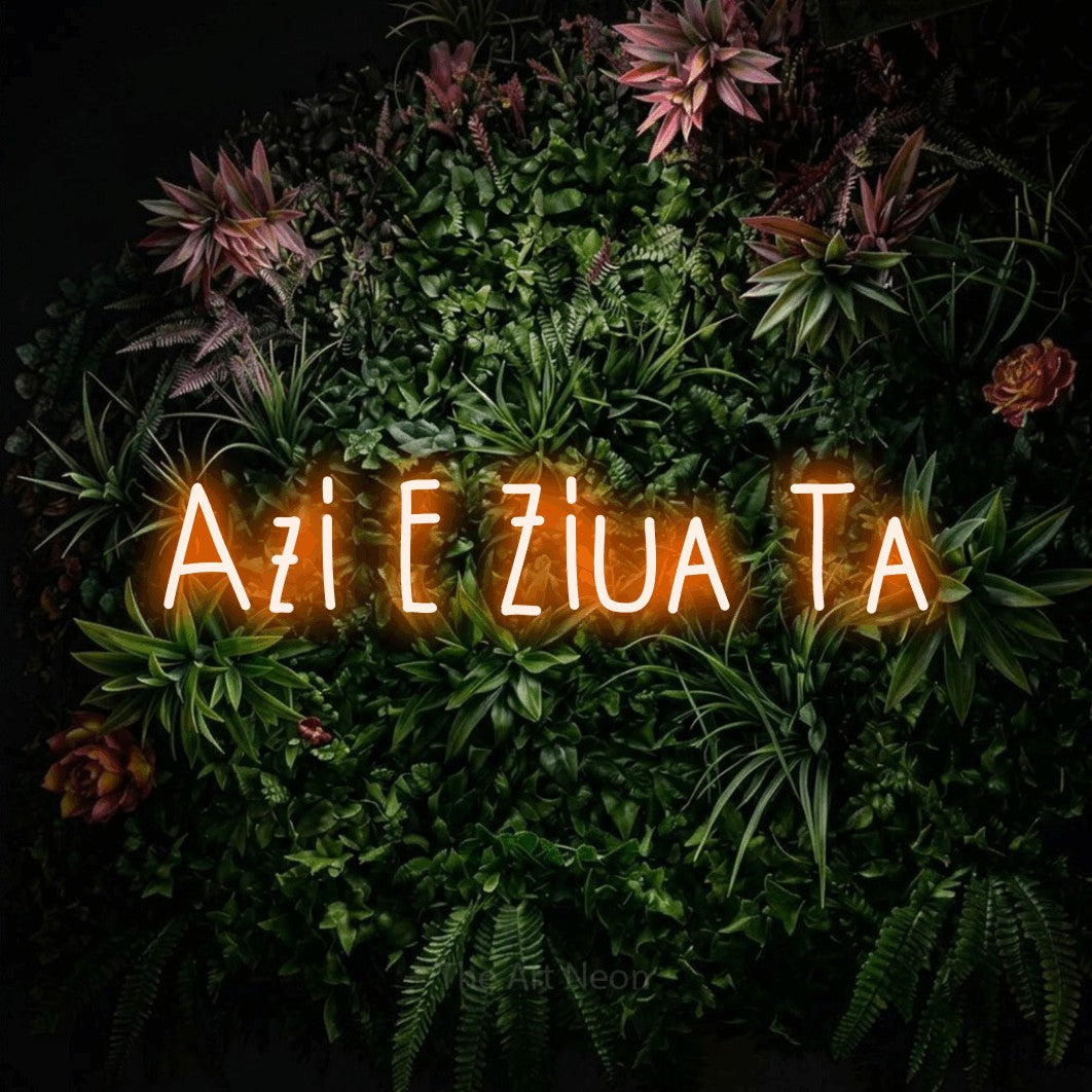 LED neon sign reading “Azi E Ziua Ta”, arranged in a single line.