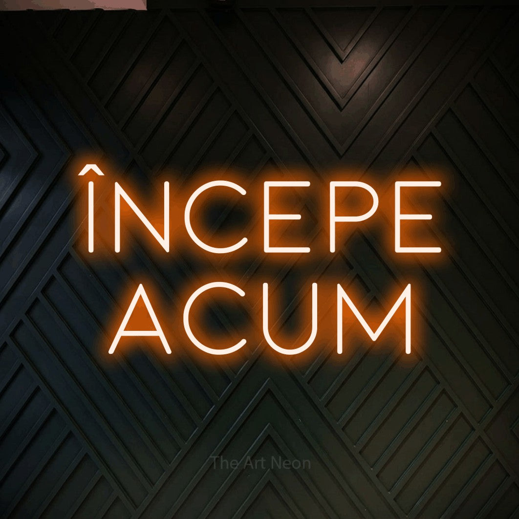 LED neon sign reading “Începe Acum”, arranged in two lines.