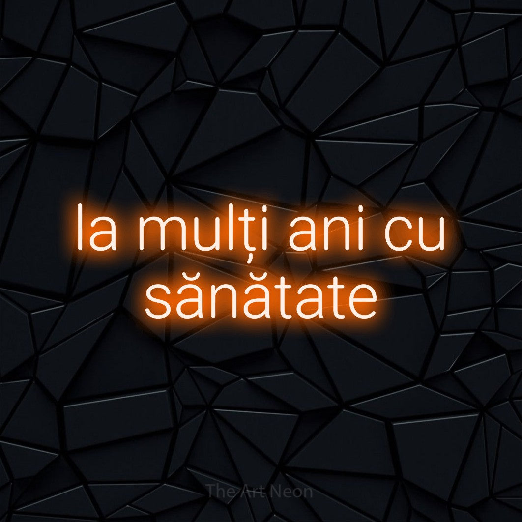 LED neon sign reading “la mulți ani cu sănătate”, arranged in two lines.