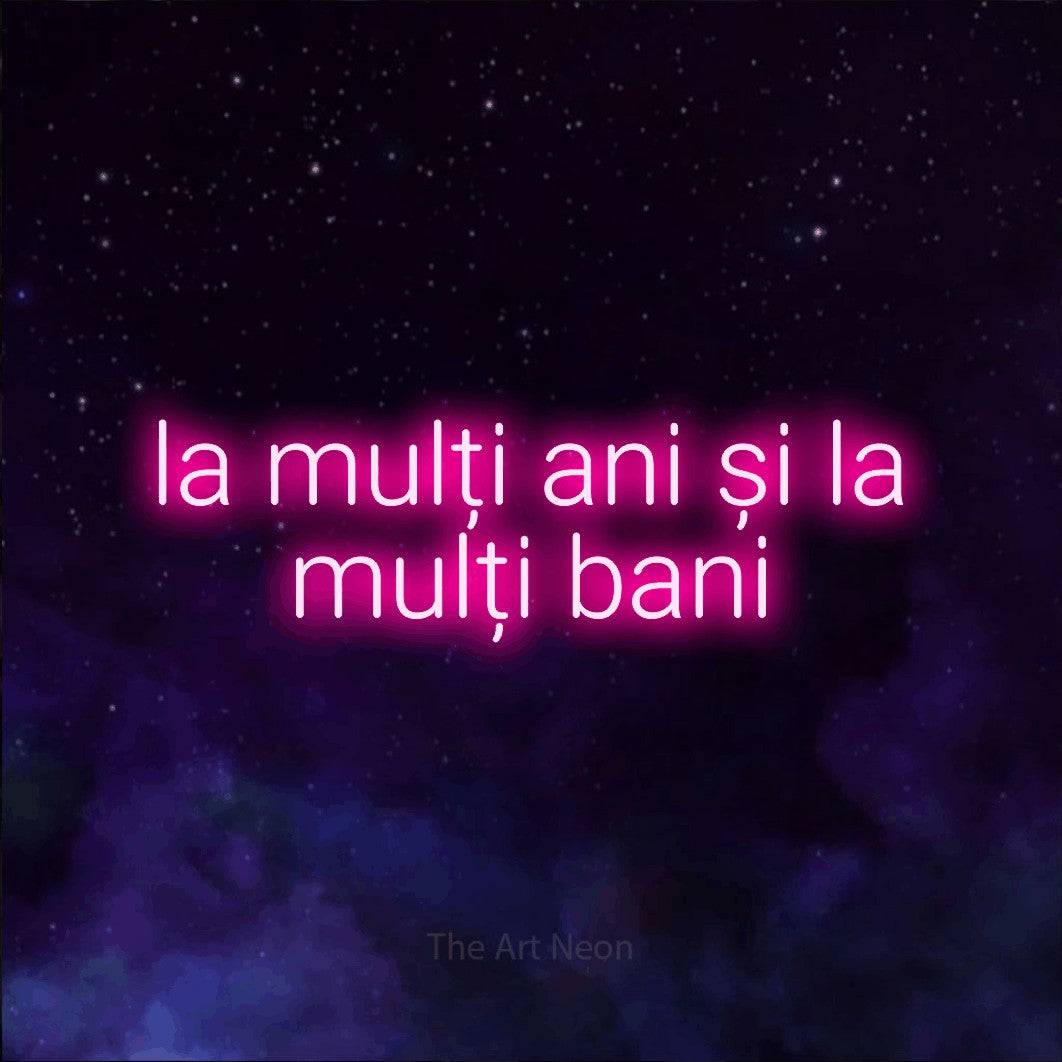 LED neon sign reading “la mulți ani și la mulți bani”, arranged in two lines.