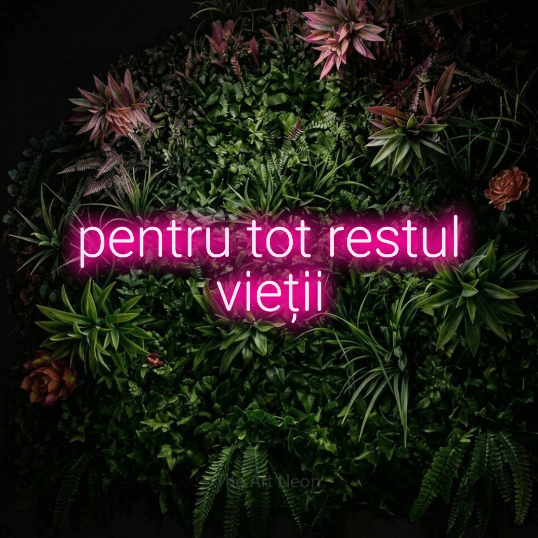 LED neon sign reading “pentru tot restul vieții”, arranged in two lines.