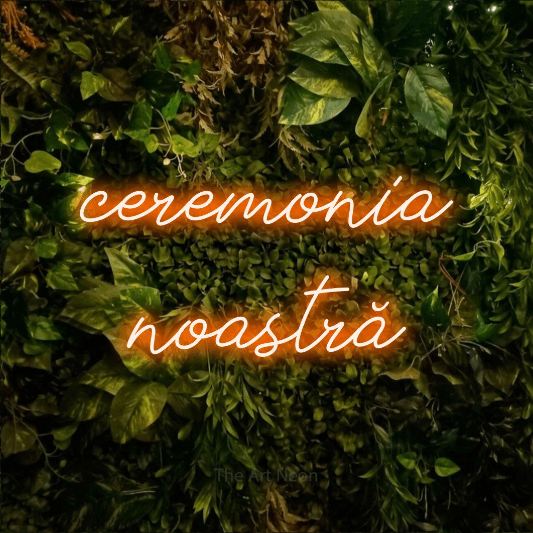 LED neon sign reading “ceremonia noastră”, arranged in two lines.