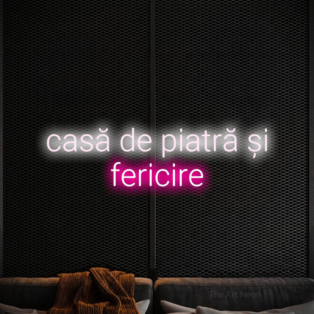 LED neon sign reading “casă de piatră și fericire”, arranged in two lines.