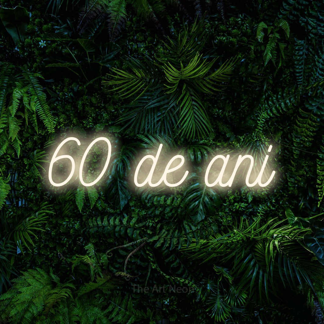 LED neon sign reading “60 de ani”, arranged in a single line.