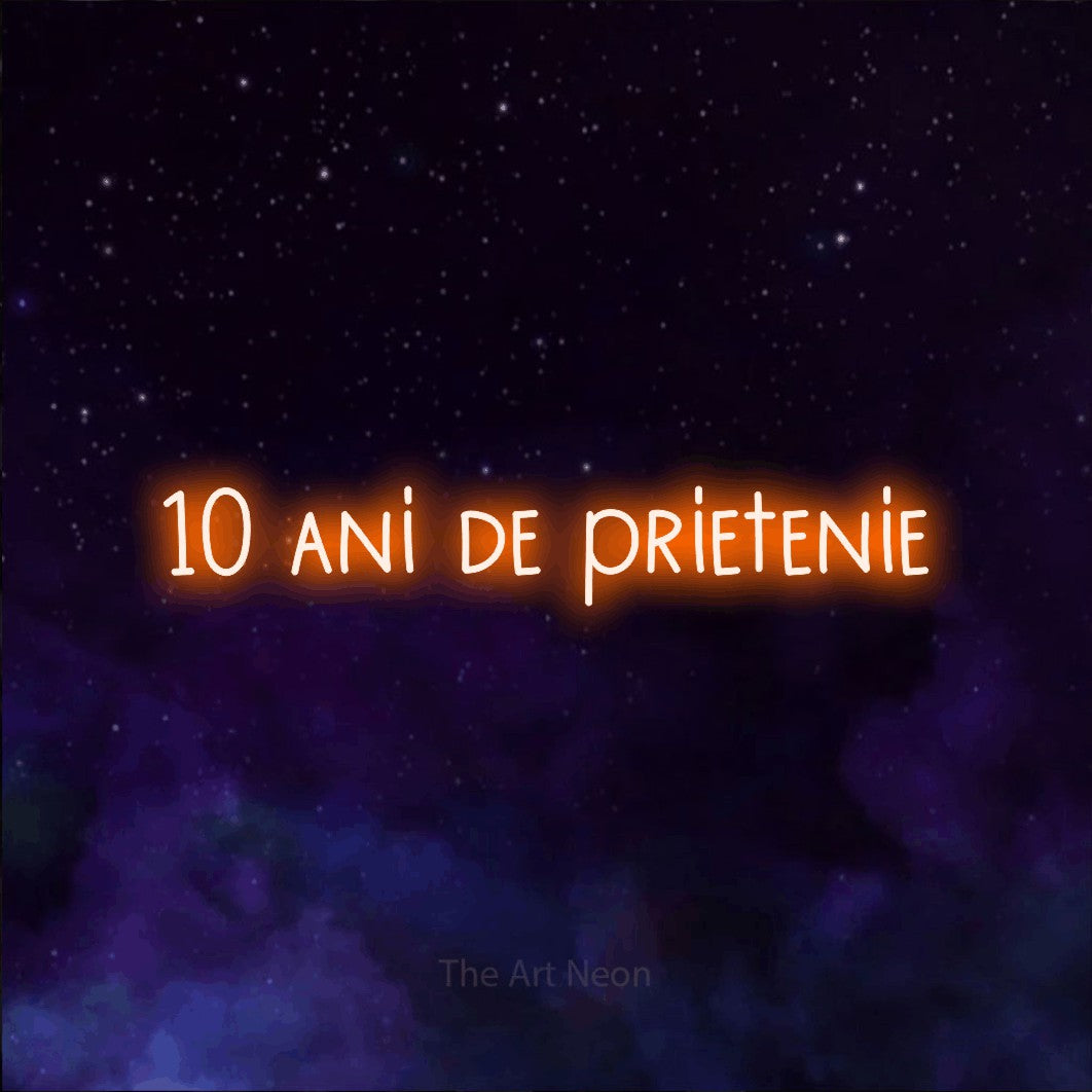 LED neon sign reading “10 ani de prietenie”, arranged in a single line.