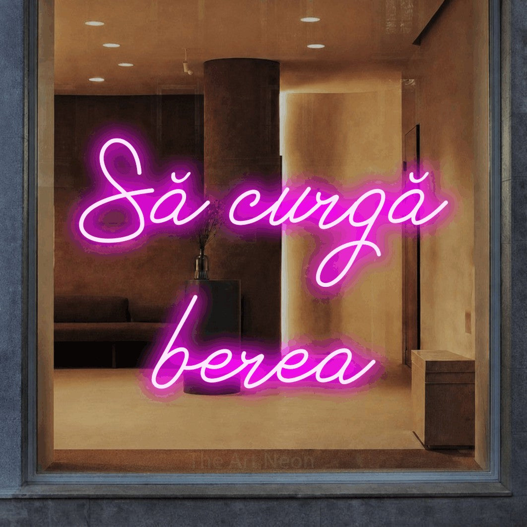 LED neon sign reading “Să curgă berea”, arranged in two lines.
