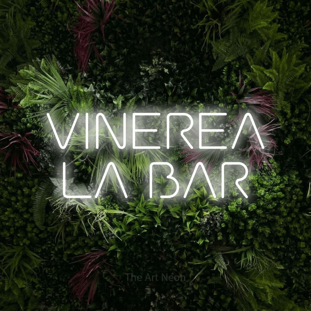 LED neon sign reading “VINEREA LA BAR”, arranged in two lines.