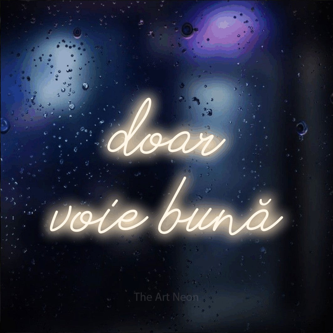 LED neon sign reading “doar voie bună”, arranged in two lines.
