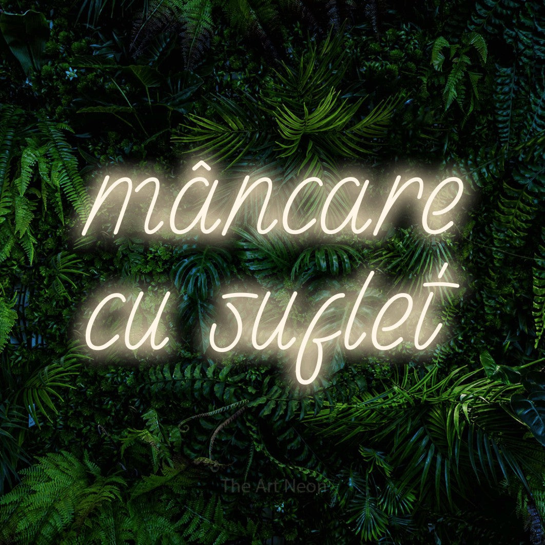 LED neon sign reading “mâncare cu suflet”, arranged in two lines.