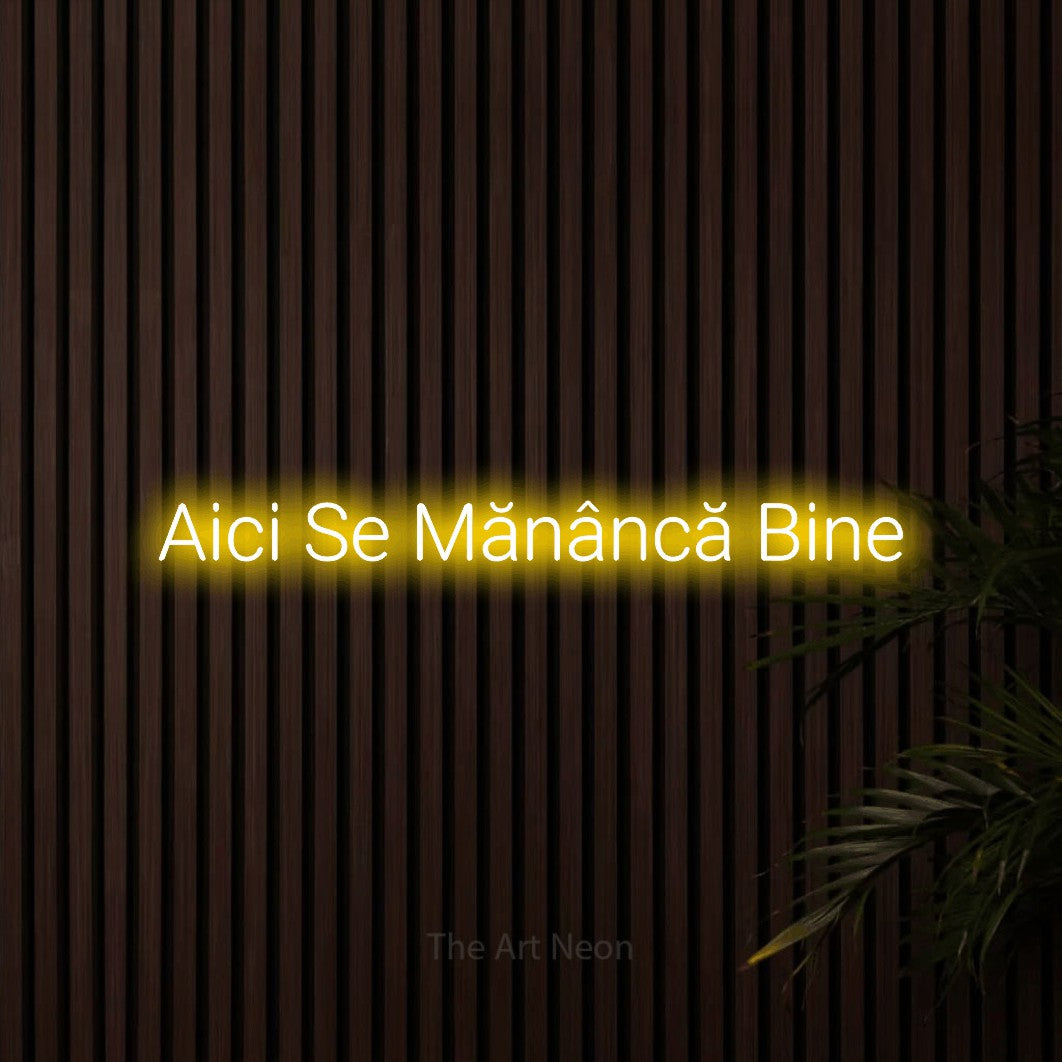 LED neon sign reading “Aici Se Mănâncă Bine”, arranged in a single line.