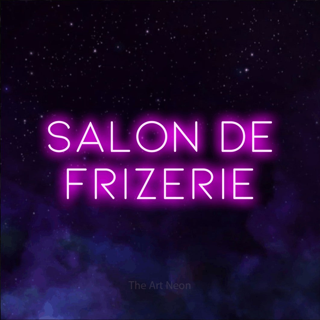 LED neon sign reading “Salon de Frizerie”, arranged in two lines.