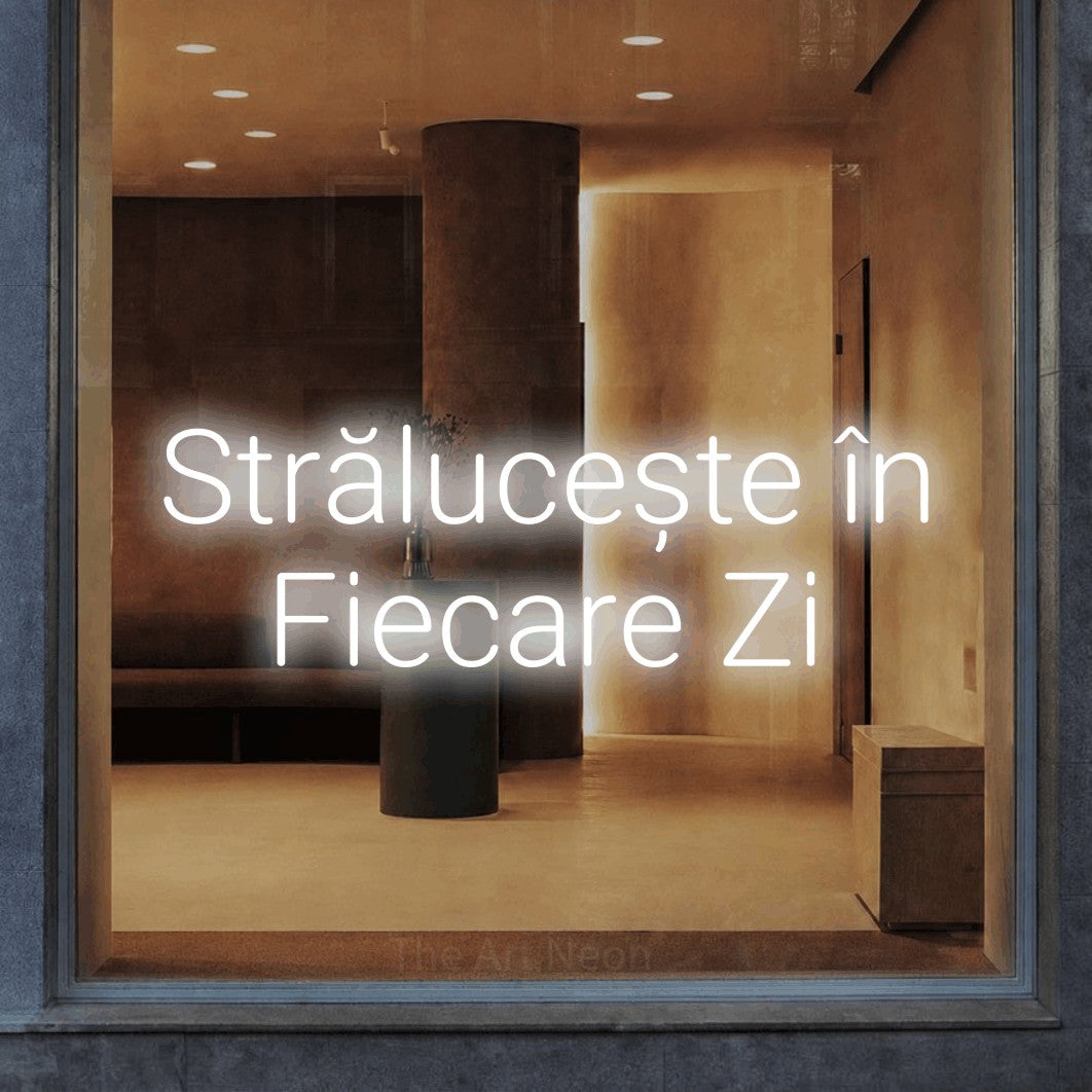 LED neon sign reading “Strălucește în Fiecare Zi”, arranged in two lines.