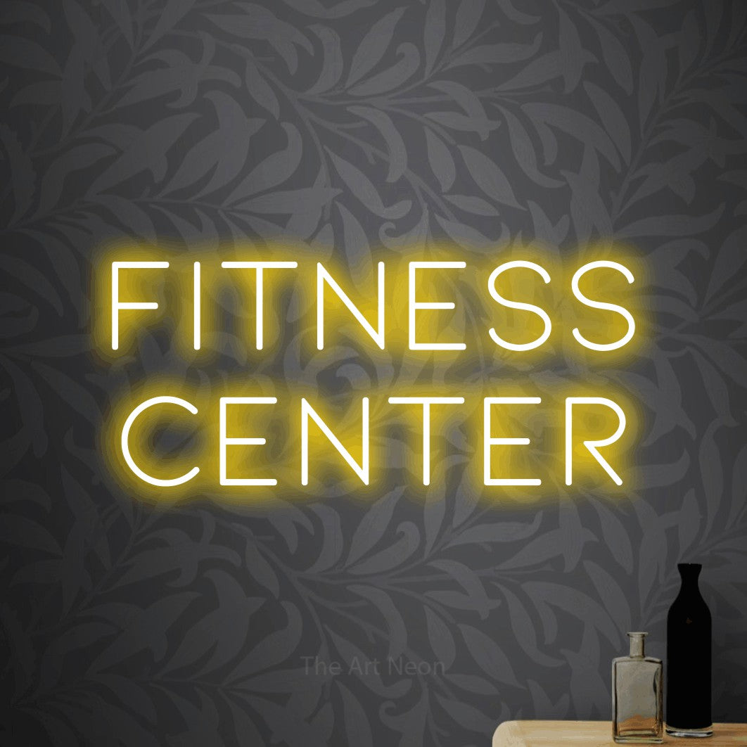 LED neon sign reading “fitness center”, arranged in two lines.